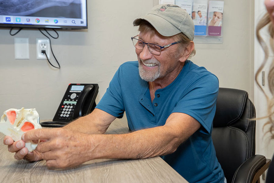 Consultation of a patient interested in Full Mouth Dental Implants