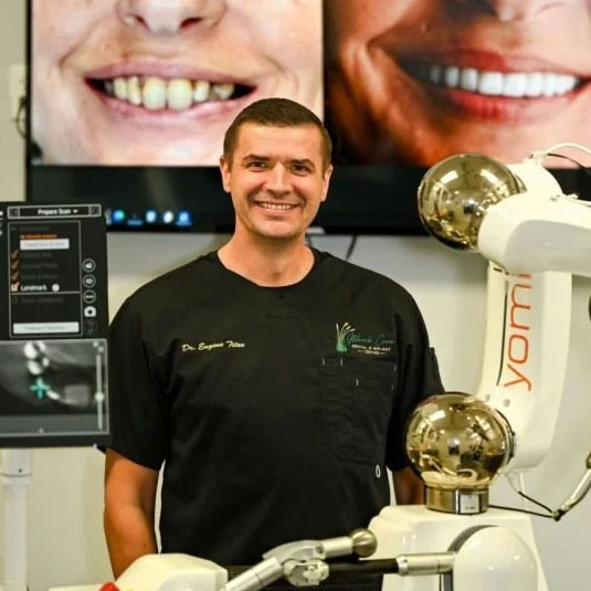 Dr. Eugene Titov from Marsh Cove Dental & Implant Center and his Smile Design equipment